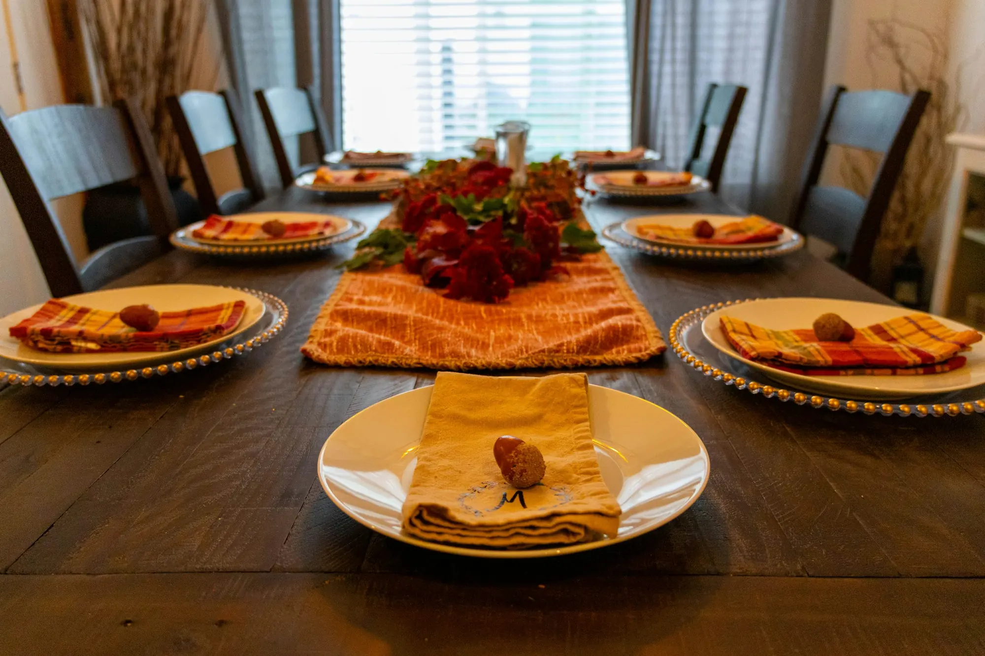 Holiday dinner table set with autumn place settings, setting boundaries with extended family in Charlotte, NC